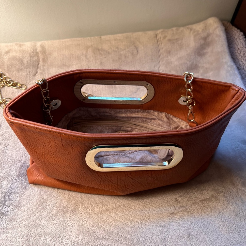 Clutch dark tan color